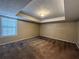 A cozy bedroom featuring neutral walls, plush carpet and a window with blinds at 287 Bramlett Meadows Dr, Douglasville, GA 30134