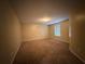 A cozy bedroom featuring neutral walls, plush carpet and a window with blinds at 287 Bramlett Meadows Dr, Douglasville, GA 30134