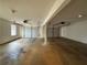 Spacious three-car garage with good lighting and three white garage doors at 287 Bramlett Meadows Dr, Douglasville, GA 30134