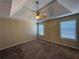 Cozy main bedroom with tray ceiling, fan, carpeting and large windows at 287 Bramlett Meadows Dr, Douglasville, GA 30134
