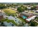 A birds-eye view of a school in a suburban area with many mature trees and parking at 937 Willingham Dr # 7, Hapeville, GA 30354