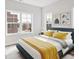 Bedroom with neutral walls, two large windows, and ample space for furnishings at 937 Willingham Dr # 7, Hapeville, GA 30354