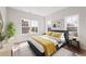 Bedroom with neutral walls, two large windows, and ample space for furnishings at 937 Willingham Dr # 7, Hapeville, GA 30354