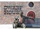 Statue of founder sitting on a bench with the Dwarf House in the background at 937 Willingham Dr # 7, Hapeville, GA 30354