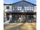 Charming townhome featuring a modern facade and well-manicured lawn at 937 Willingham Dr # 7, Hapeville, GA 30354
