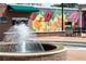 A beautifully designed water fountain with colorful art mural enhances a neighborhood at 937 Willingham Dr # 7, Hapeville, GA 30354