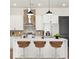 Modern kitchen with stainless steel appliances, large island, and stylish counter seating at 937 Willingham Dr # 7, Hapeville, GA 30354