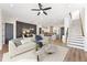 Open living area with stylish furniture, decorative wall paneling and modern decor at 937 Willingham Dr # 7, Hapeville, GA 30354