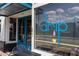 Charming coffee shop with inviting blue door and large windows at 937 Willingham Dr # 7, Hapeville, GA 30354