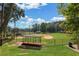 Picturesque baseball field surrounded by lush greenery and trees, perfect for sports and recreation at 941 Willingham Dr # 5, Hapeville, GA 30354