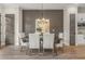 Elegant dining area with stylish lighting, wood accents, and comfortable seating at 941 Willingham Dr # 5, Hapeville, GA 30354