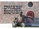 The Dwarf House location featuring the statue, brick building, and unique architectural elements at 941 Willingham Dr # 5, Hapeville, GA 30354