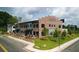New Hapeville townhome construction featuring modern architecture, landscaping, and street view at 941 Willingham Dr # 5, Hapeville, GA 30354