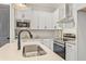 Bright kitchen featuring white countertops, stainless steel sink and appliances at 941 Willingham Dr # 5, Hapeville, GA 30354