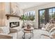 Cozy living room with fireplace, abundant natural light, and stylish decor at 941 Willingham Dr # 5, Hapeville, GA 30354
