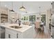 Open-concept living area with modern kitchen, dining space, and comfortable seating at 941 Willingham Dr # 5, Hapeville, GA 30354