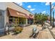 Quaint storefronts with colorful awnings and inviting entrances along a vibrant street, perfect for local businesses at 941 Willingham Dr # 5, Hapeville, GA 30354