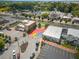 Aerial shot of a colorful street featuring a rainbow heart mural, surrounded by buildings, parking, and greenery at 941 Willingham Dr # 5, Hapeville, GA 30354