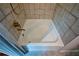 Clean bathtub surrounded by modern tile, offering a serene bathing experience at 2112 Starfire Ne Dr, Atlanta, GA 30345