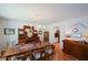Spacious dining room boasts hardwood floors, a large table, and an antique buffet at 2112 Starfire Ne Dr, Atlanta, GA 30345