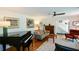 Well-lit living room with hardwood floors, stylish furniture, and direct access to the staircase at 2112 Starfire Ne Dr, Atlanta, GA 30345