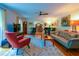 Cozy living room with hardwood floors, area rug, and stylish furnishings including a piano at 2112 Starfire Ne Dr, Atlanta, GA 30345