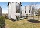 Exterior view showcasing modern home, fenced yard, and manicured landscaping in a desirable neighborhood at 219 Howell Se Dr # A, Atlanta, GA 30316