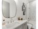 Modern bathroom features a sleek vanity with quartz countertops and a tiled shower/tub combo at 219 Howell Se Dr # A, Atlanta, GA 30316