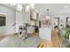 Open floor plan features dining area adjacent to kitchen and living room with modern decor at 219 Howell Se Dr # A, Atlanta, GA 30316