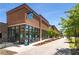 Modern brick building with large windows, offering a mix of retail and commercial spaces at 219 Howell Se Dr # A, Atlanta, GA 30316