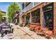 Charming storefront featuring red brick, black framed windows, and patio seating at 219 Howell Se Dr # A, Atlanta, GA 30316