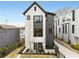 Modern two-story home featuring a black and white color scheme and manicured front yard at 219 Howell Se Dr # A, Atlanta, GA 30316