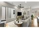 Serene living area with a large sofa, modern decor, and natural light with exterior views at 219 Howell Se Dr # A, Atlanta, GA 30316