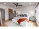 This light and airy main bedroom offers hardwood floors, modern ceiling fan, and minimalist design at 219 Howell Se Dr # A, Atlanta, GA 30316