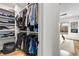 Spacious walk-in closet with custom shelving for maximum storage; adjacent to the main bedroom at 219 Howell Se Dr # A, Atlanta, GA 30316