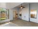Spacious covered patio perfect for entertaining, featuring ample seating and views of the landscaped backyard at 310 Tuggle Court, Woodstock, GA 30188