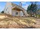 Large backyard with an elevated deck and stairs, ideal for enjoying the outdoor space and entertaining guests at 564 Grand Ashbury Ln, Sugar Hill, GA 30518