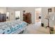 Spacious main bedroom with en suite bathroom access, plenty of light and walk-in closet at 564 Grand Ashbury Ln, Sugar Hill, GA 30518