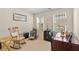 Functional office space with natural light, featuring traditional decor and furniture at 564 Grand Ashbury Ln, Sugar Hill, GA 30518