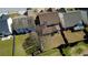 Aerial view of fenced backyard with mature tree, showcasing neighborhood homes at 1295 Leisure Lake Dr, Lawrenceville, GA 30044