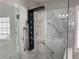 Close up of a glass shower featuring modern showerhead and chrome accents at 1295 Leisure Lake Dr, Lawrenceville, GA 30044