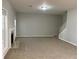Living room with neutral colored carpet, fireplace and bright windows at 1295 Leisure Lake Dr, Lawrenceville, GA 30044