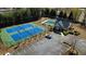 Aerial view featuring well-maintained community tennis courts, clubhouse and pool at 1295 Leisure Lake Dr, Lawrenceville, GA 30044