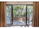 Balcony with sliding glass doors and outdoor views, ideal for relaxation at 1303 Highland Bluff Se Dr # 303, Atlanta, GA 30339