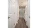 Bright bathroom featuring white vanity, shower and wood-look flooring at 1303 Highland Bluff Se Dr # 303, Atlanta, GA 30339