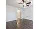 Bright bedroom with ceiling fan and hardwood floors, creating a cozy retreat at 1303 Highland Bluff Se Dr # 303, Atlanta, GA 30339