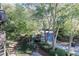Community view showcasing lush landscaping and a serene environment at 1303 Highland Bluff Se Dr # 303, Atlanta, GA 30339
