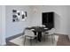 Stylish dining room with modern chandelier, seating for four, and sophisticated decor at 1303 Highland Bluff Se Dr # 303, Atlanta, GA 30339