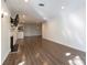 Spacious living area with wood floors flowing into the dining area and kitchen at 1303 Highland Bluff Se Dr # 303, Atlanta, GA 30339