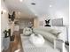 Contemporary living room with modern furniture, fireplace, and hardwood floors, designed for comfort and style at 1303 Highland Bluff Se Dr # 303, Atlanta, GA 30339